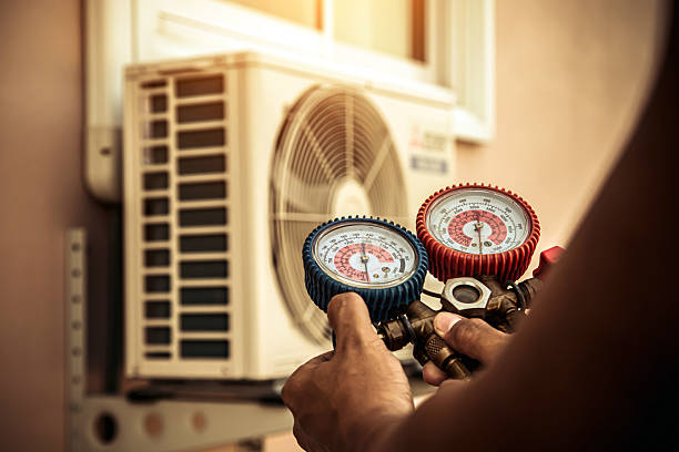 Professional Hvac technician working in Mantua, VA